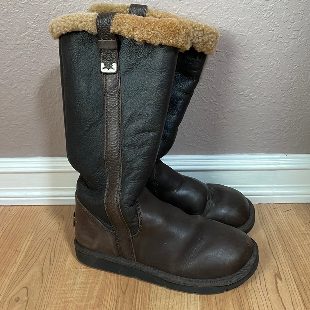 UGG boots with unique buckle, leather accent and side zipper